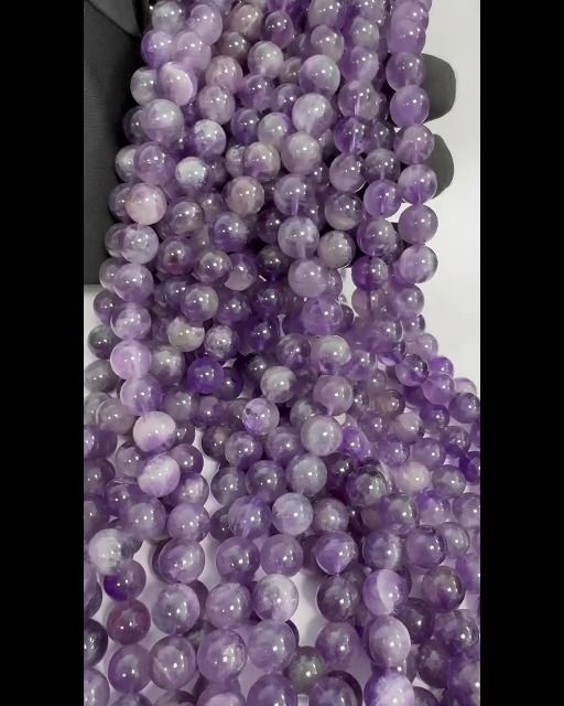 Amethyste perles 10mm sur fil 40cm