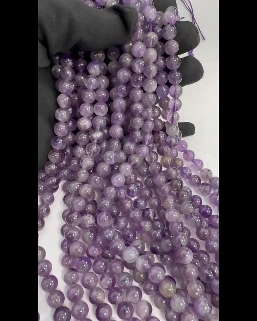 Amethyste perles 7.5-8.5mm sur fil 40cm